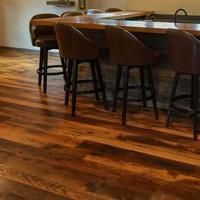 Skip-Planed Reclaimed Oak Flooring and Bar Barn Siding